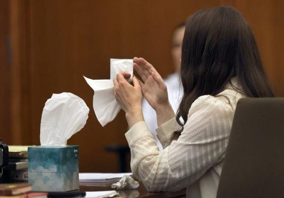 Lindsay Clancy grabs a tissue after witness Elaine Rossi, the nanny to the Clancy children, testified at Plymouth Superior Court in Plymouth on August 5, 2026.